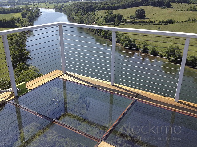 Jockimo Outdoor Glass Flooring See Through Deck Overlooking Water and Trees