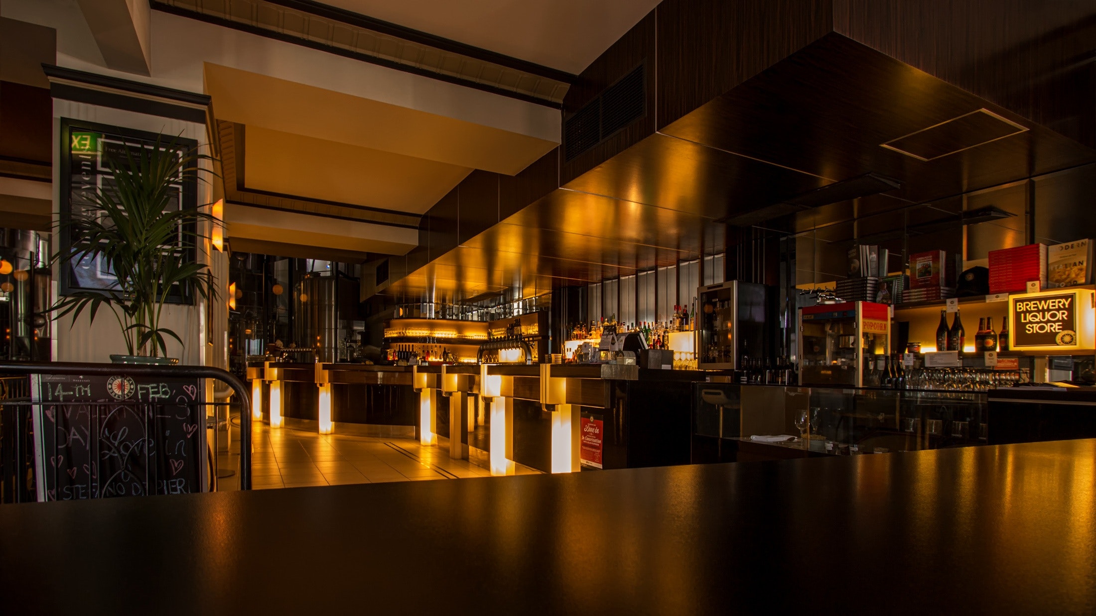 Dark Hotel Restaurant Playing with Lighting and Interior Design